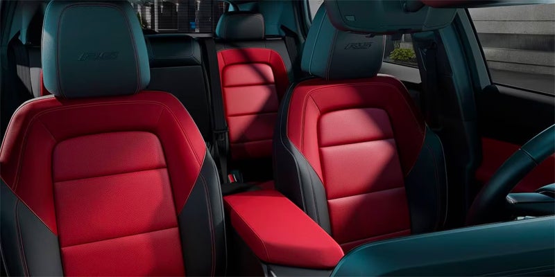 front right angle view of the red leather interior of the 2024 chevy equinox ev