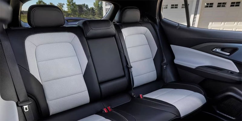 right angle view of black and white leather back seats of the 2024 chevy equinox ev