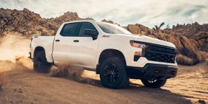 a white 2024 Chevy Silverado 1500 driving in the desert | Vancouver