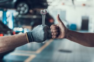 Close-up,Thumb,Up,And,Mechanics,Hand,With,Tool.,Automobile,Master | Alan Webb Chevy